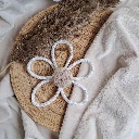 marguerite-tricotin-pompon-decoration-murale-chambre-bebe-boheme.webp